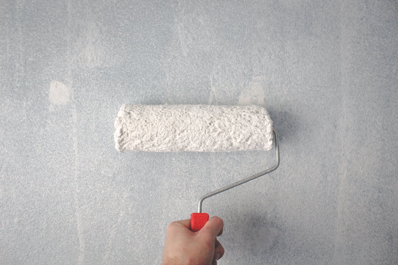 Paint Roller On Wall 